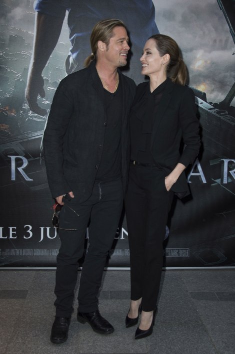  Brad Pitt and Angelina Jolie at the Paris premiere of WORLD WAR Z, from Paramount Pictures and Skydance Productions, in association with Hemisphere Media Capital and GK Films, at the UGC Normandie in Paris on June 3rd, 2013. WORLD WAR Z opens in theaters on 6/21/13.